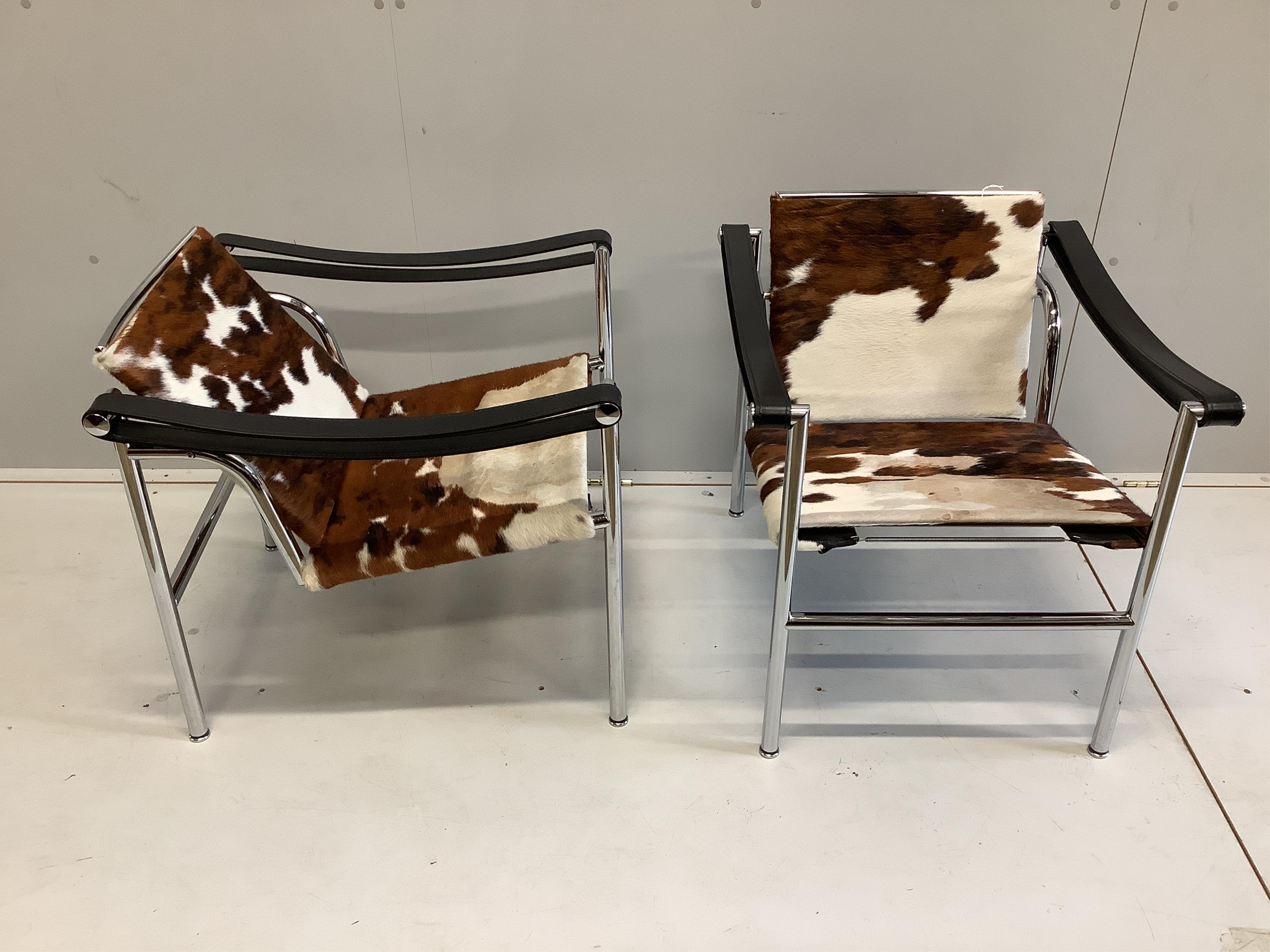 A pair of Cassina Le Corbusier LE 1 pony skin chairs, width 59cm, depth 64cm, height 64cm